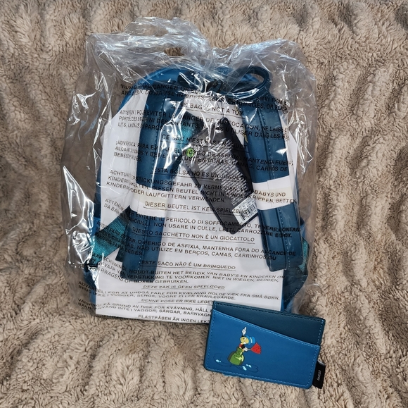 LOUNGEFLY Pinocchio Monstro Backpack & Cardholder - Picture 5 of 8